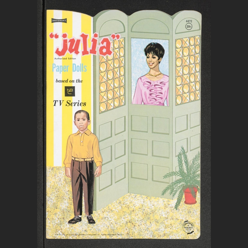A photo of vintage Julia paper dolls